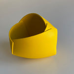 344. YELLOW OBJECT BY ANN VAN HOEY